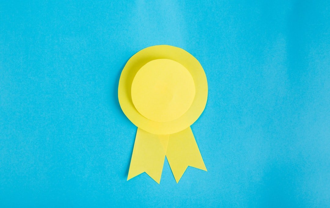 private-party-01 Yellow paper made ribbon on light blue background