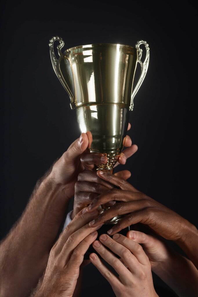 Studio Portrait Handball Players Holding Prize 1 683x1024